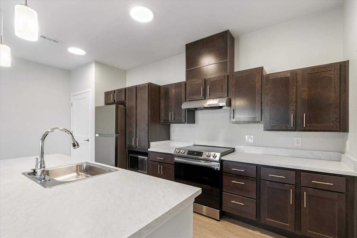 Apartment kitchen — representative home at Sunland Flats.