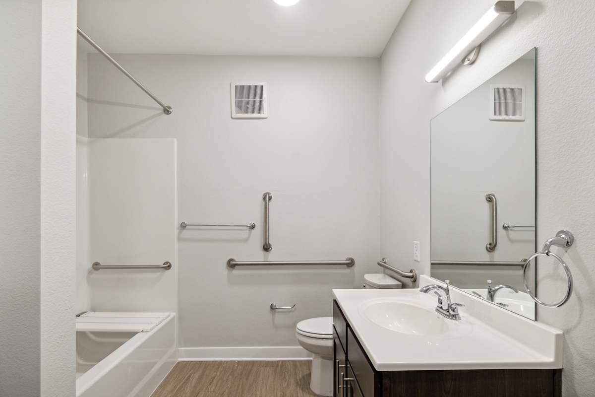 Bathroom with grab bars shown at Sunland Flats.