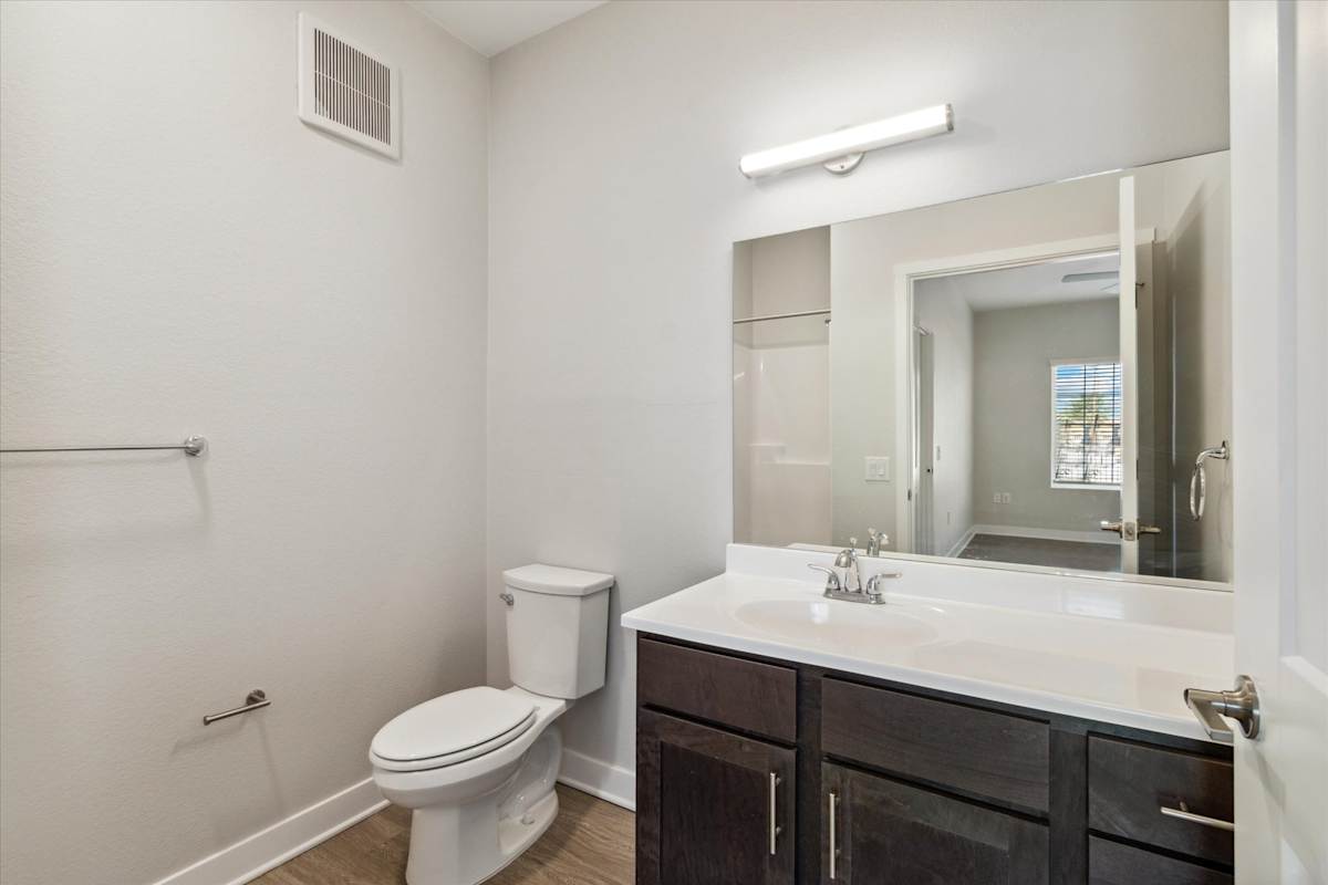 Apartment bathroom — representative home at Sunland Flats.