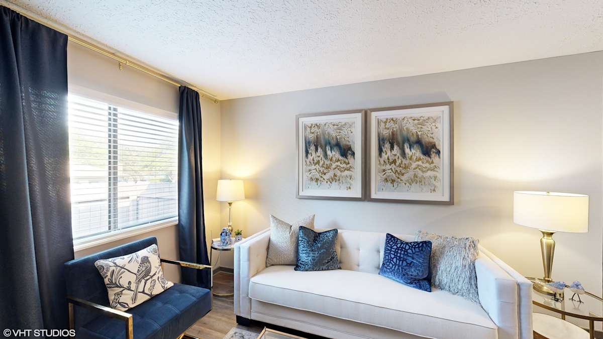 Silvertree at Little Turtle Apartments living room with wall art - Westerville, OH