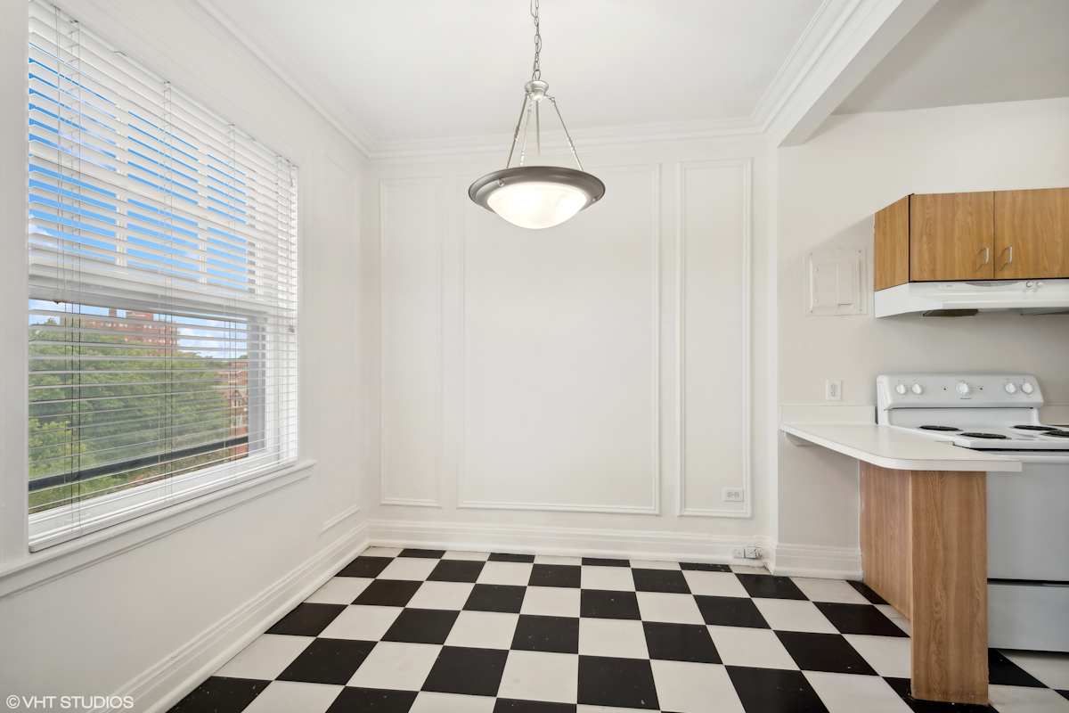 CWE Apartments kitchen with checkered floor - St. Louis, MO