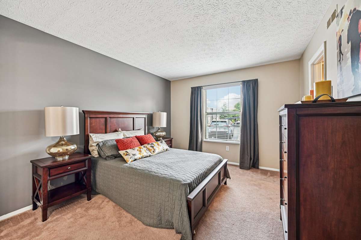 Island Club Apartments bedroom with balcony view - Columbus, OH