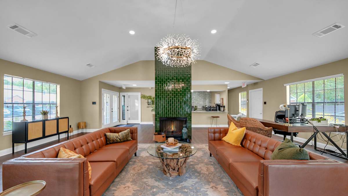 The Birches Apartment Homes living room with fireplace - Memphis, TN
