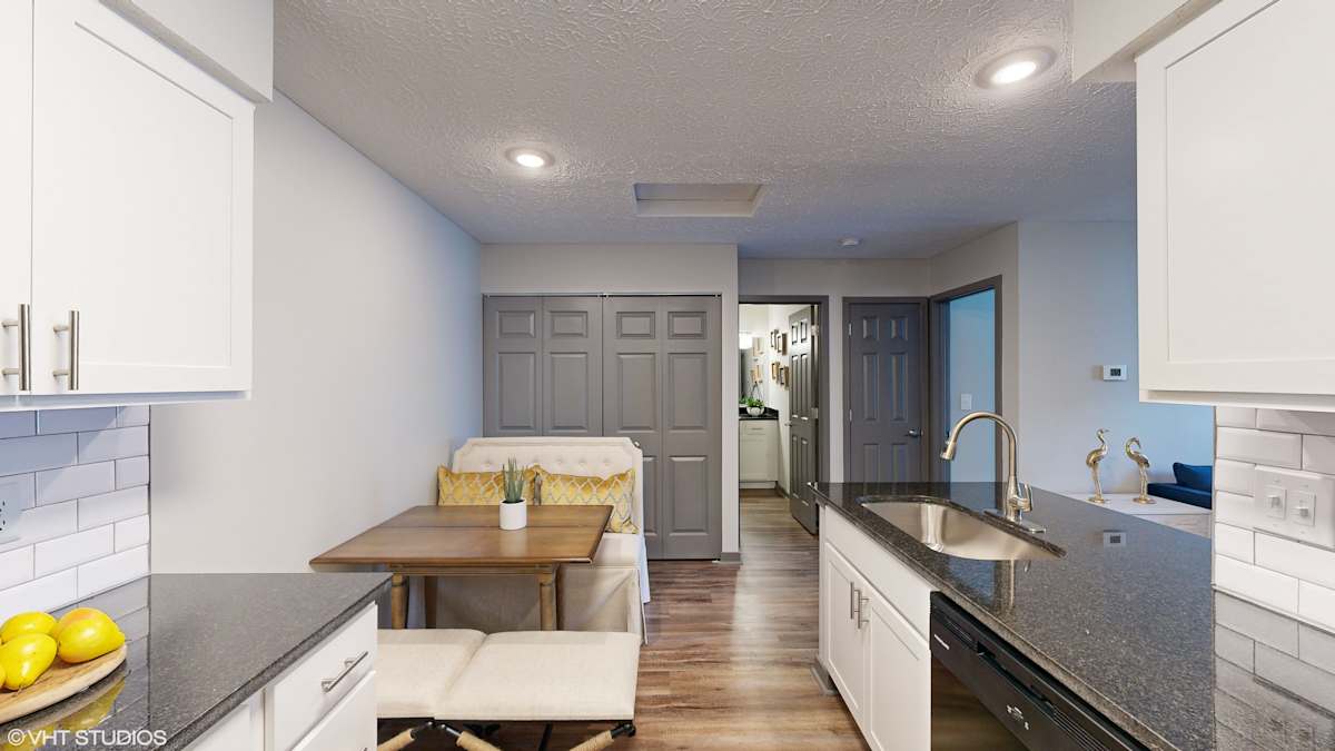 Springburne at Polaris Apartments kitchen with white cabinets - Columbus, OH