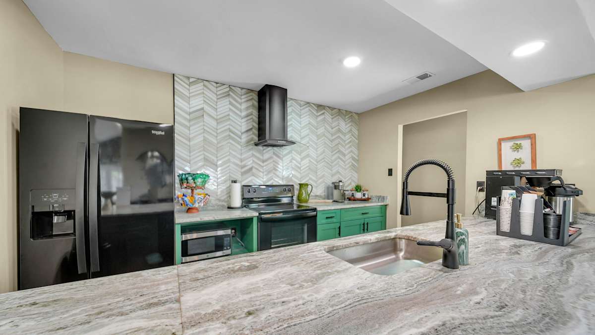 The Birches Apartment Homes updated kitchen with stone counters - Memphis, TN