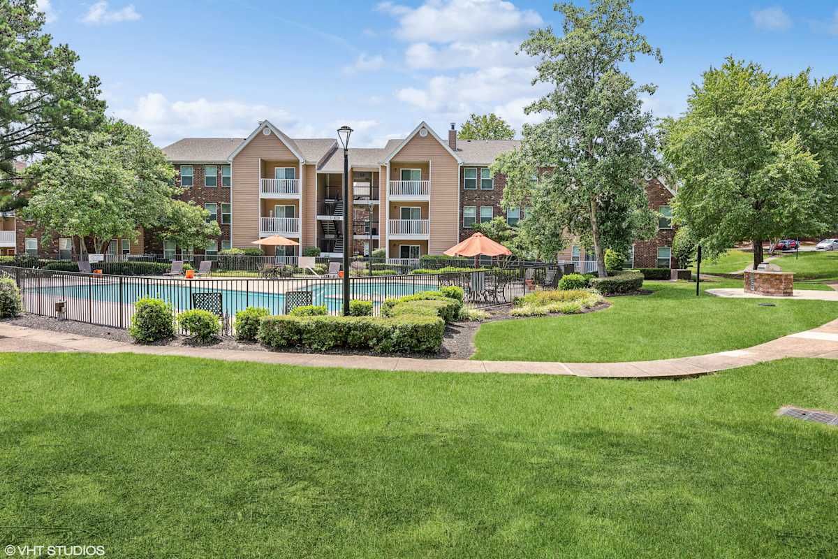 The Local Apartments pool and green courtyard - Memphis, TN