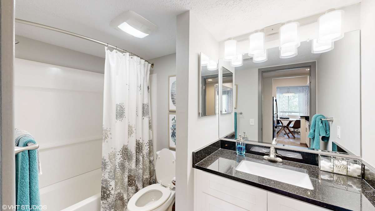 Runaway Bay Apartments bathroom vanity and mirror - Columbus, OH