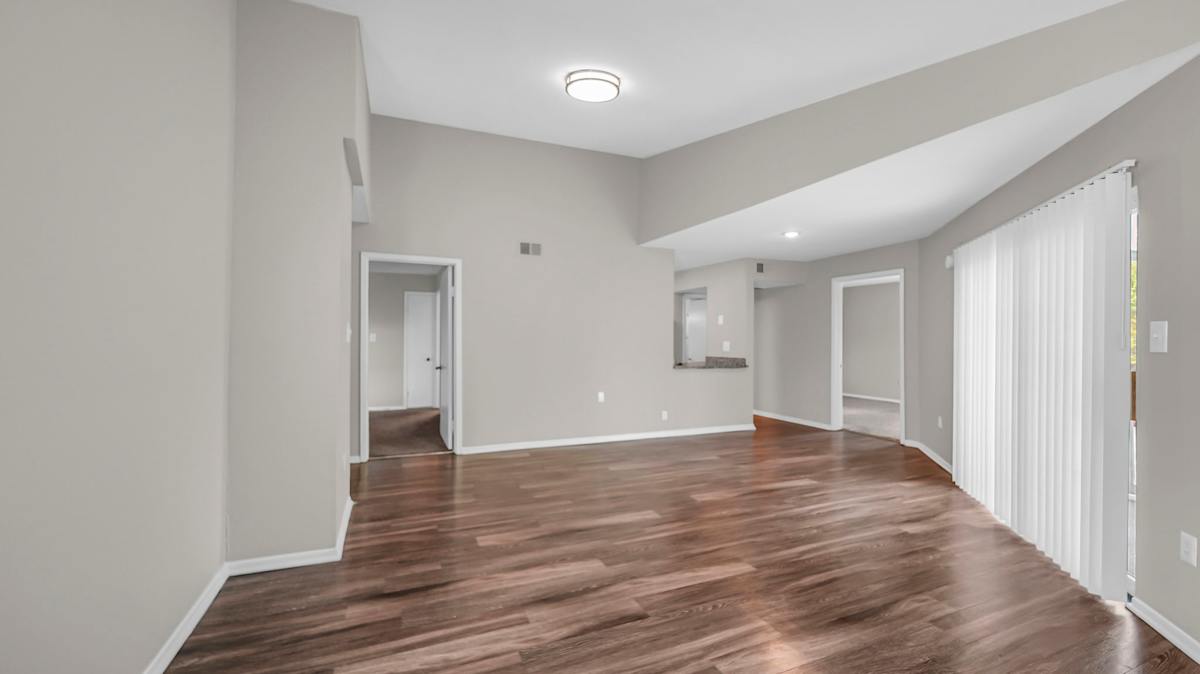 The Nova Apartments room with wood-look flooring - Memphis, TN