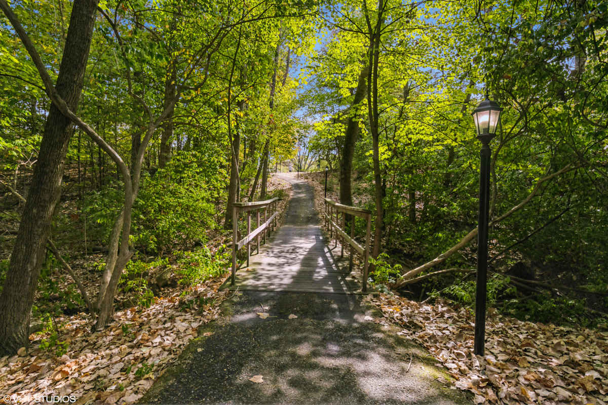 Silvertree at Little Turtle Apartments wooded bridge trail - Westerville, OH