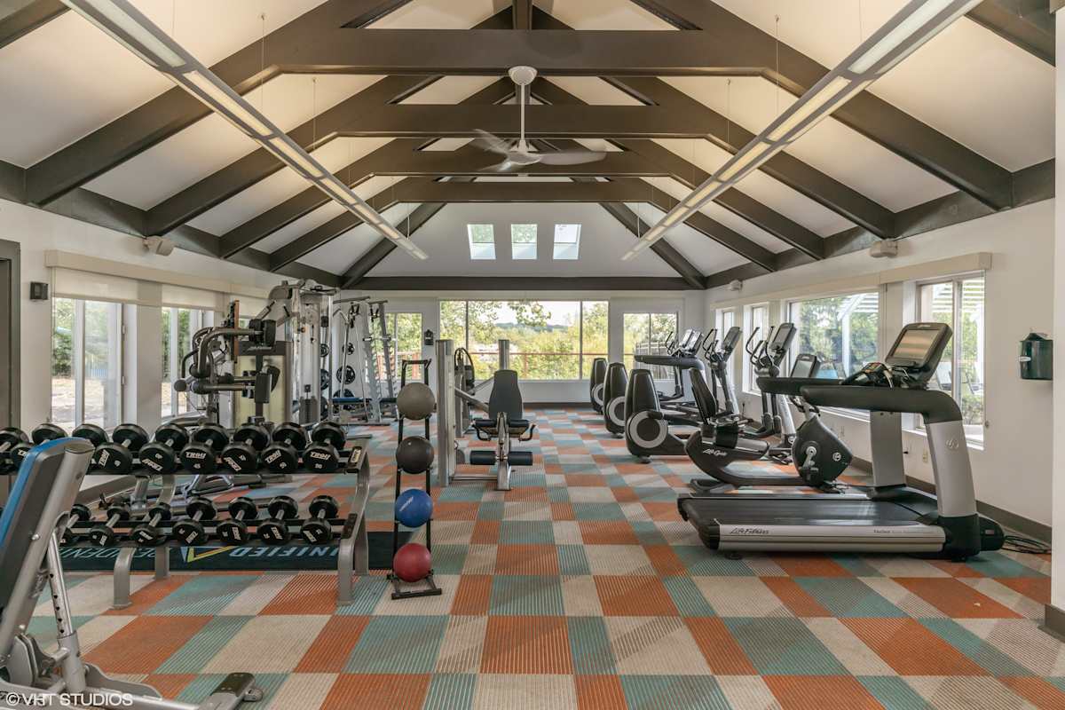 Runaway Bay Apartments fitness center with cardio and weights - Columbus, OH
