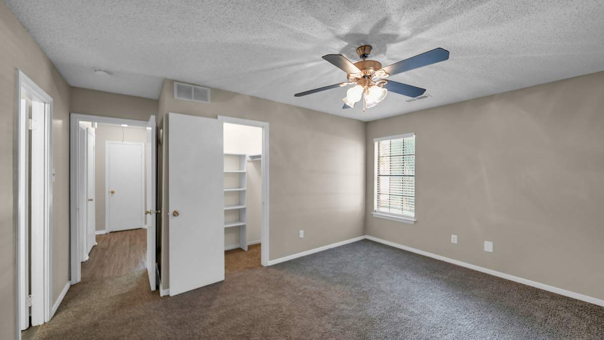 The Birches Apartment Homes bedroom with ceiling fan - Memphis, TN