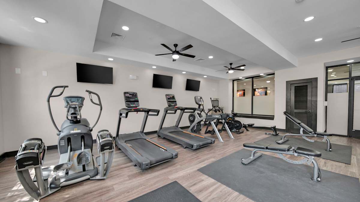 Bristol On Union Apartment Homes fitness center with cardio and weights - Memphis, TN