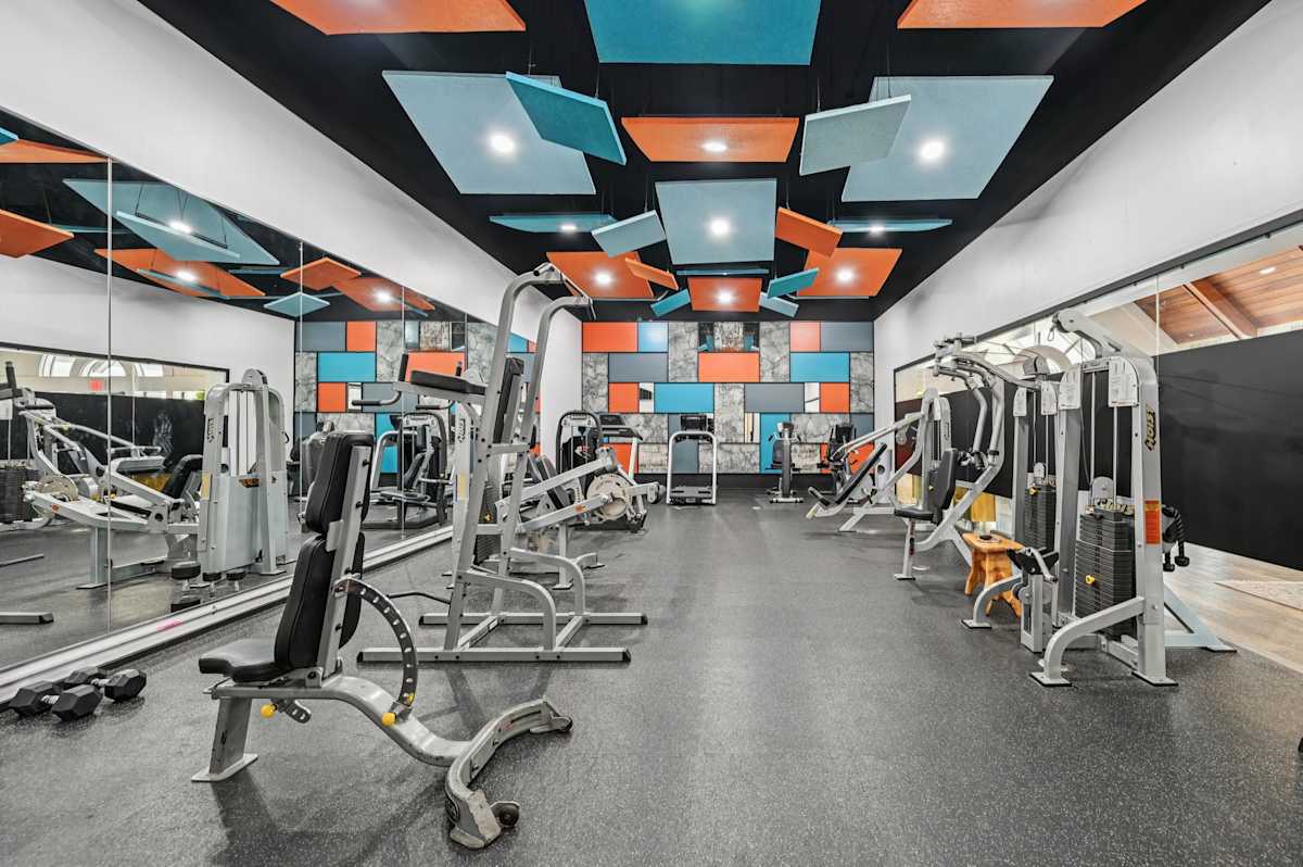 Island Club Apartments fitness center with weight machines - Columbus, OH
