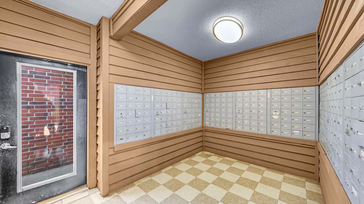 The Nova Apartments community room with brick fireplace - Memphis, TN