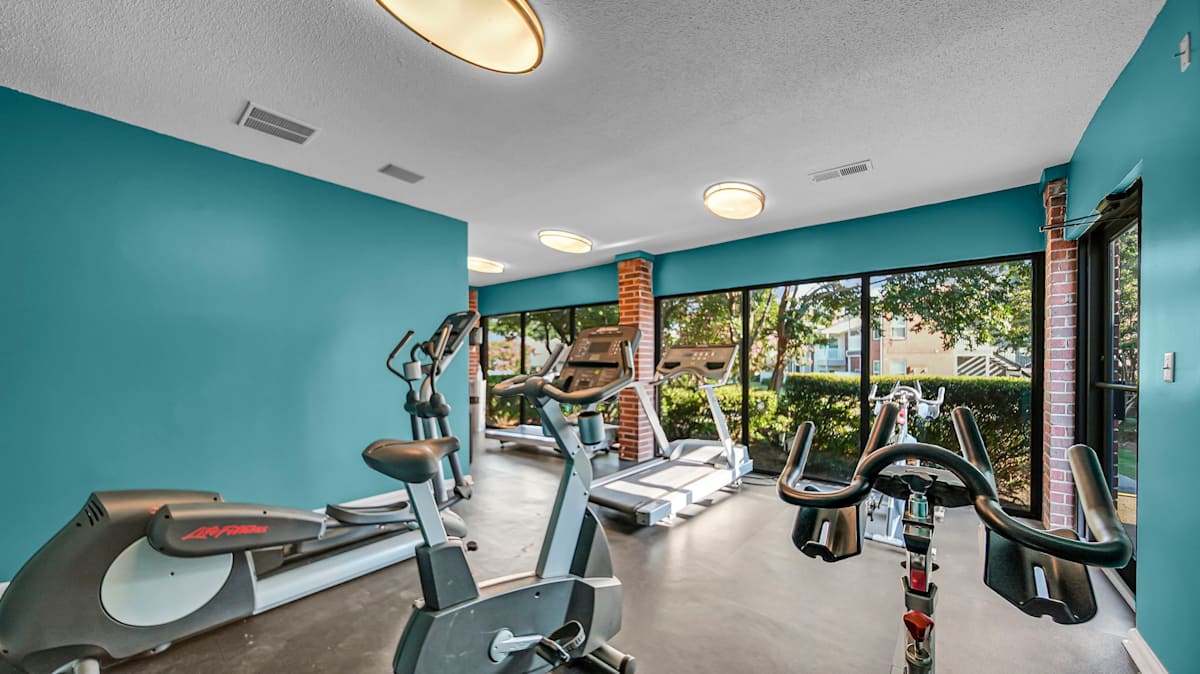 The Nova Apartments fitness center with treadmills and bikes - Memphis, TN