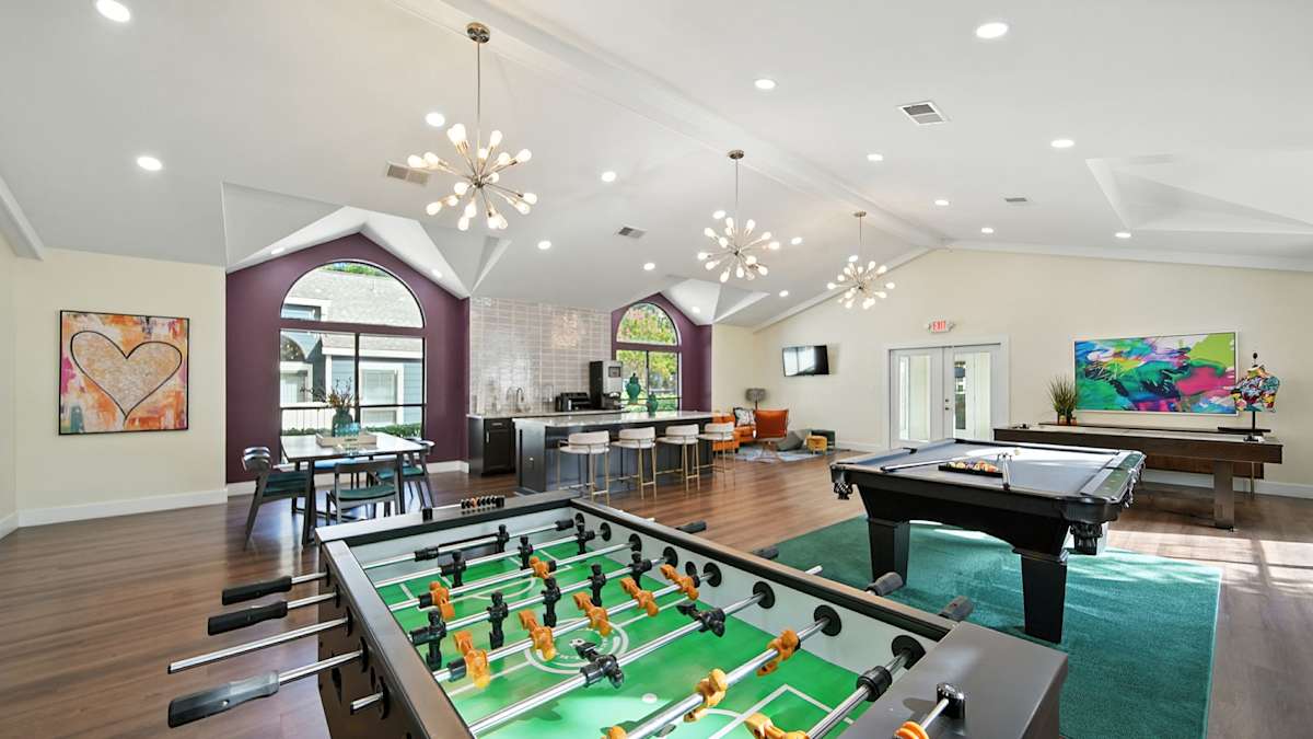 The Vale Apartments and Townhomes game room with foosball and ping pong - Cordova, TN