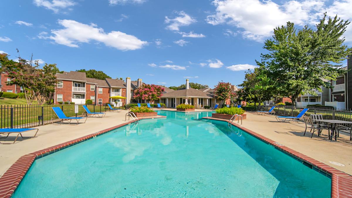The Nova Apartments resort-style pool with lounge chairs - Memphis, TN