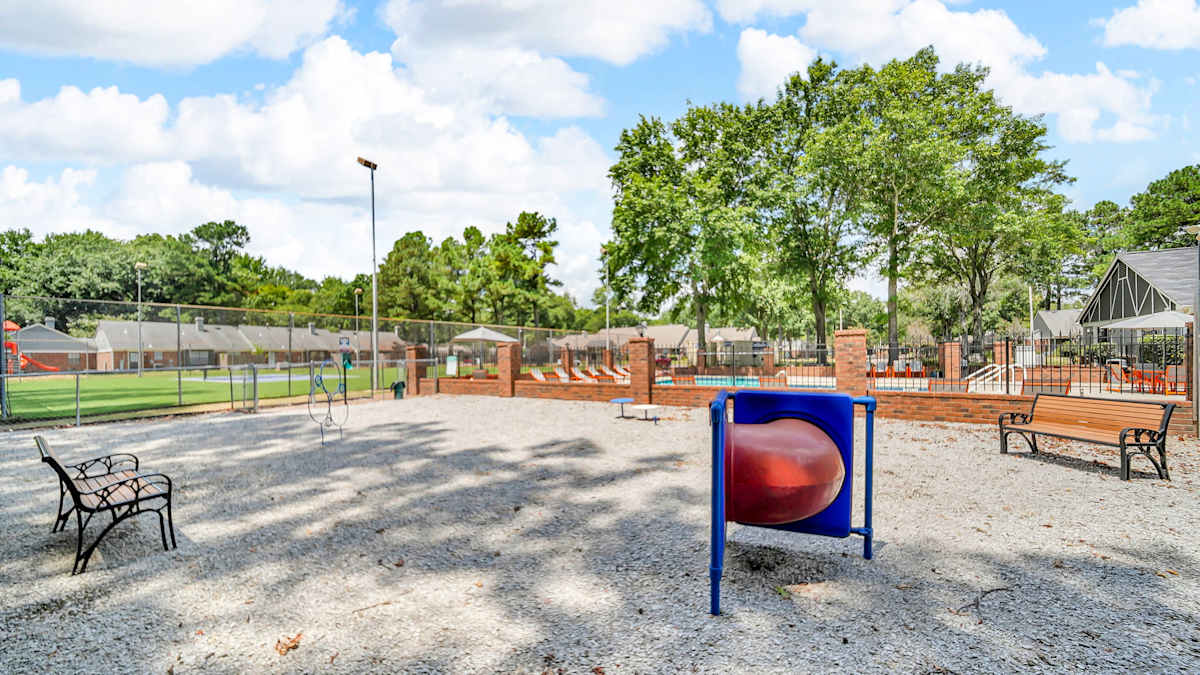The Birches Apartment Homes outdoor playground and seating - Memphis, TN