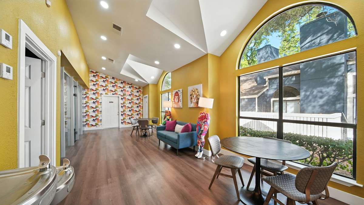 The Vale Apartments and Townhomes clubhouse hallway with seating - Cordova, TN