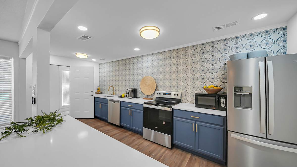 The Stella Apartments kitchen with stainless steel appliances - Memphis, TN
