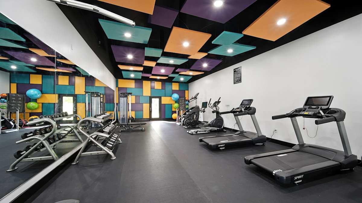 The Vale Apartments and Townhomes fitness center with cardio equipment - Cordova, TN