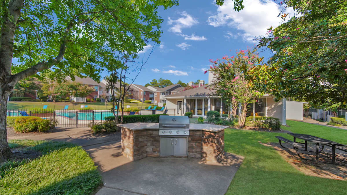 The Nova Apartments outdoor area with fire pit and pool - Memphis, TN