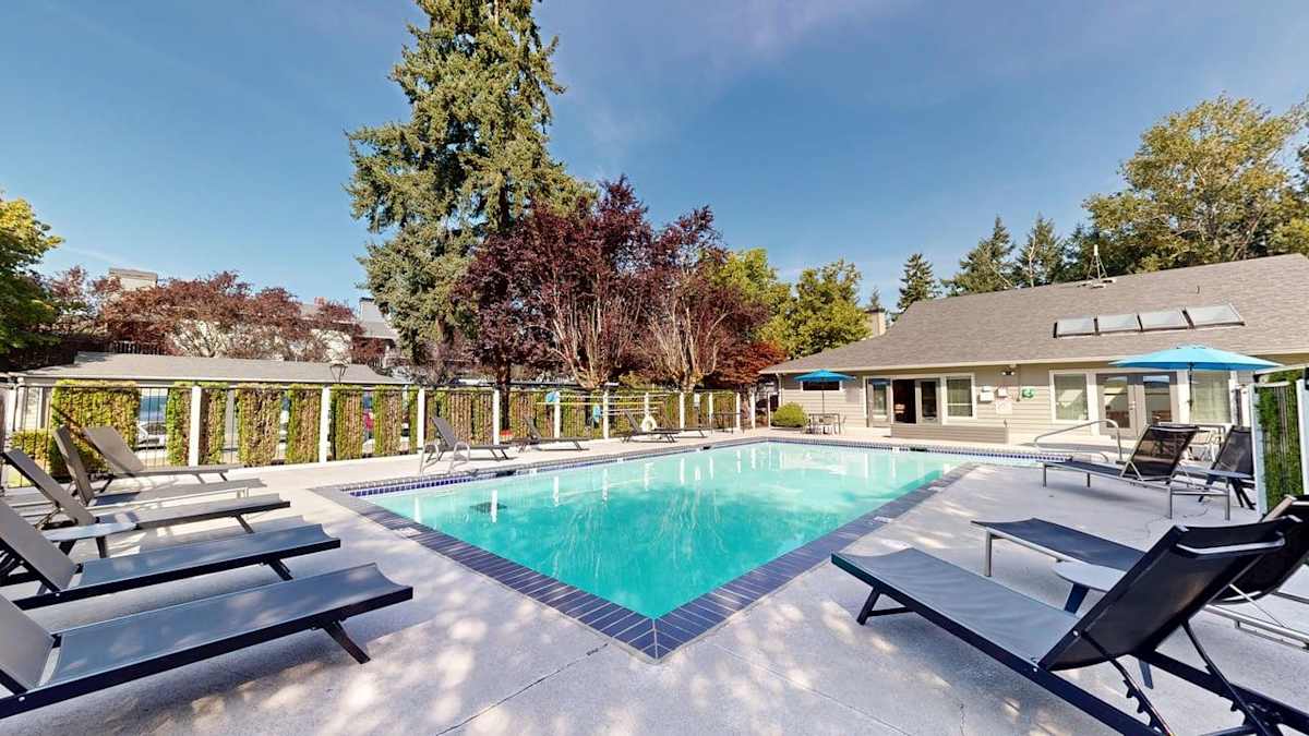 Ellyson Apartment Homes pool deck and lounge chairs - Tacoma, WA
