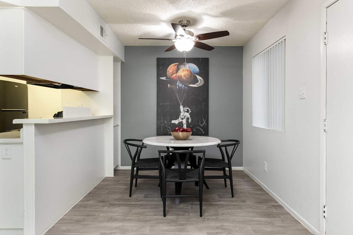 Furnished dining area shown — representative home at Stonybrook Apartments.