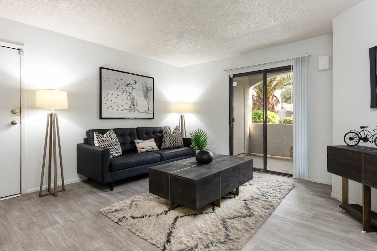 Furnished apartment living area shown — representative home at Stonybrook Apartments.