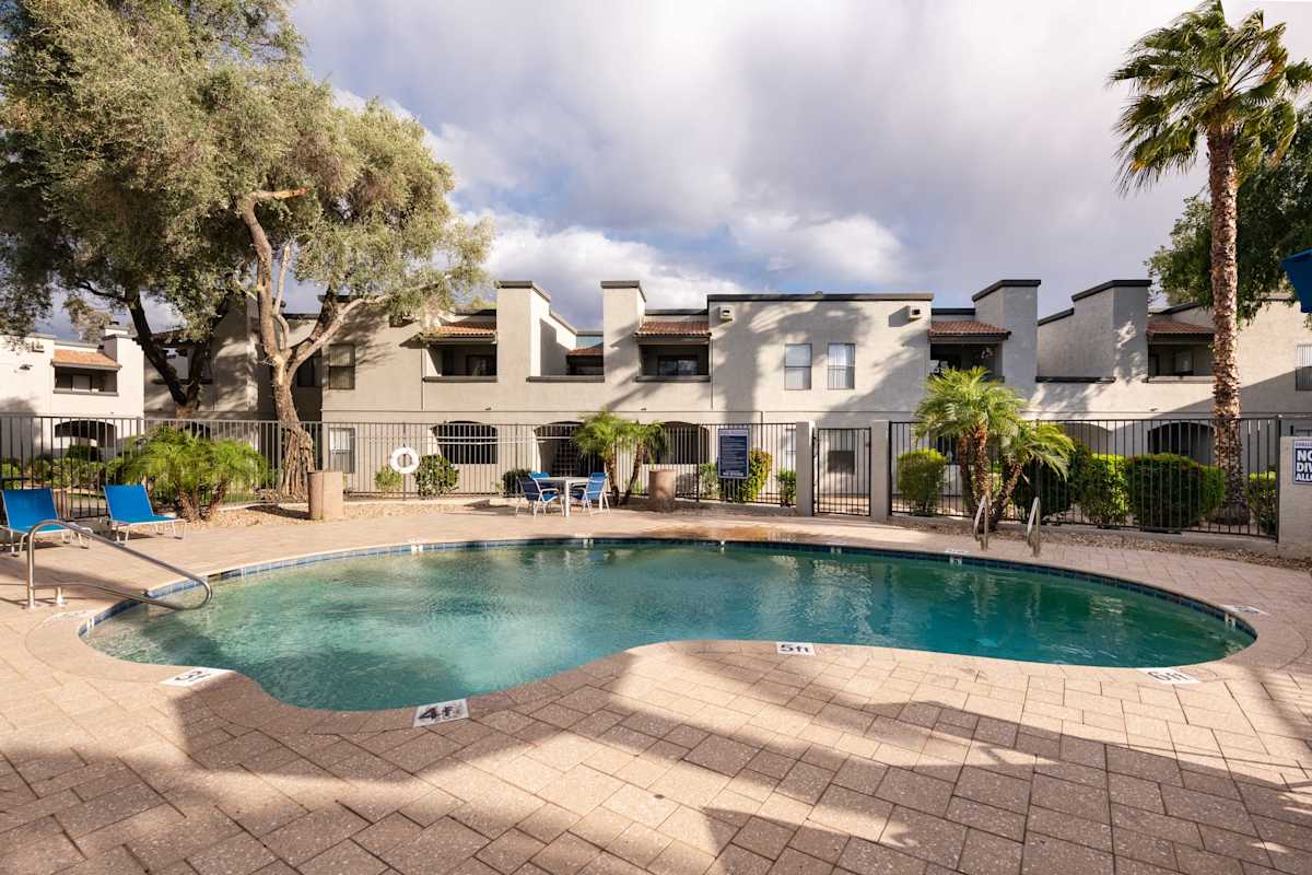 Pool and poolside area at Stonybrook Apartments.