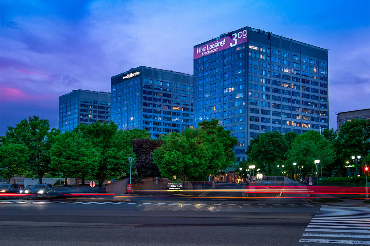 Three Collective building exterior at dusk - Falls Church, VA