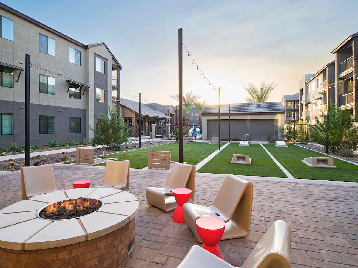 Shared outdoor seating and game lawn at Halogen.