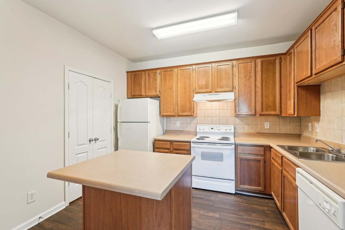 Wesley Stonecrest Apartments at Lithonia apartment kitchen and dining area - Stonecrest, GA