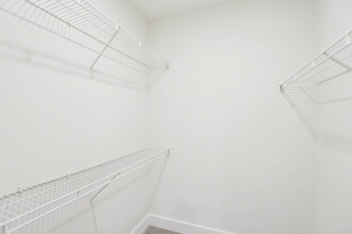 Wesley Kensington Apartments at Stonecrest apartment closet space - Stonecrest, GA