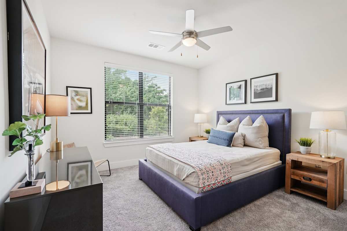 Resort-style pool with sundeck at The Kirkwood Apartments - Atlanta, GA