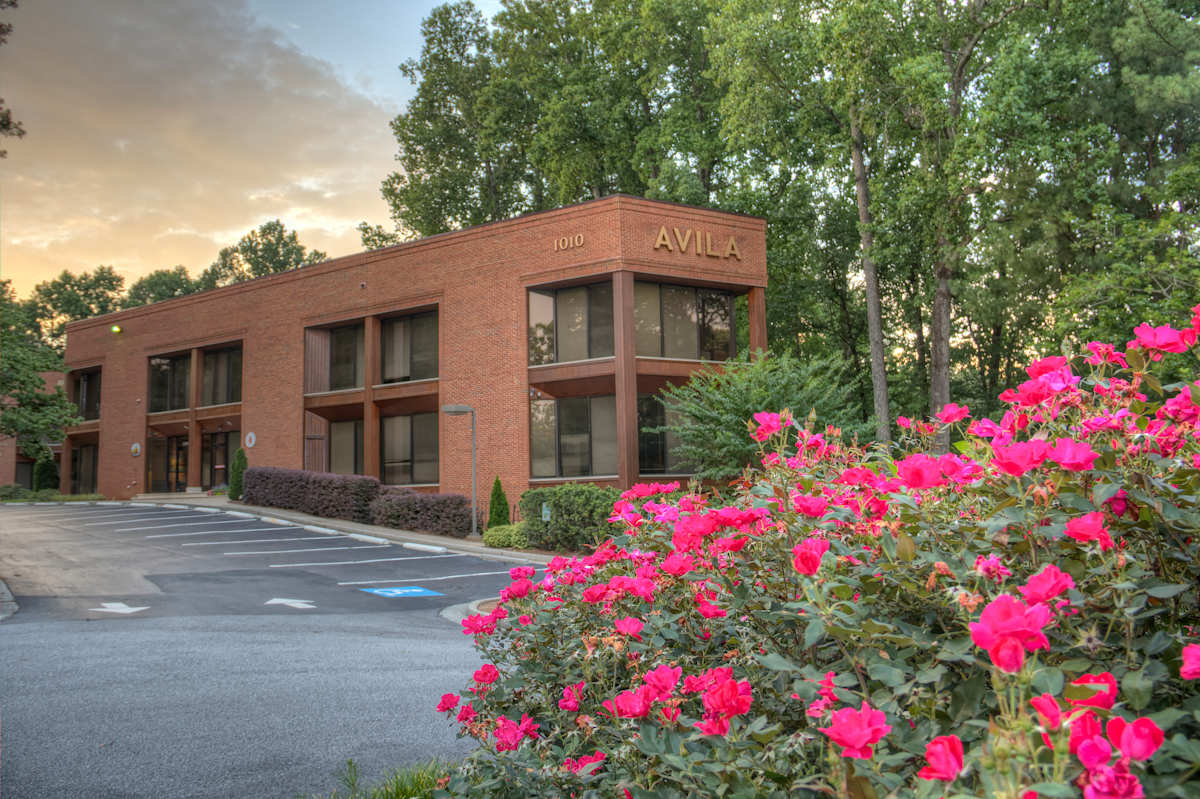 1010 Huntcliff exterior building with 1010 and AVILA signage - Atlanta, GA
