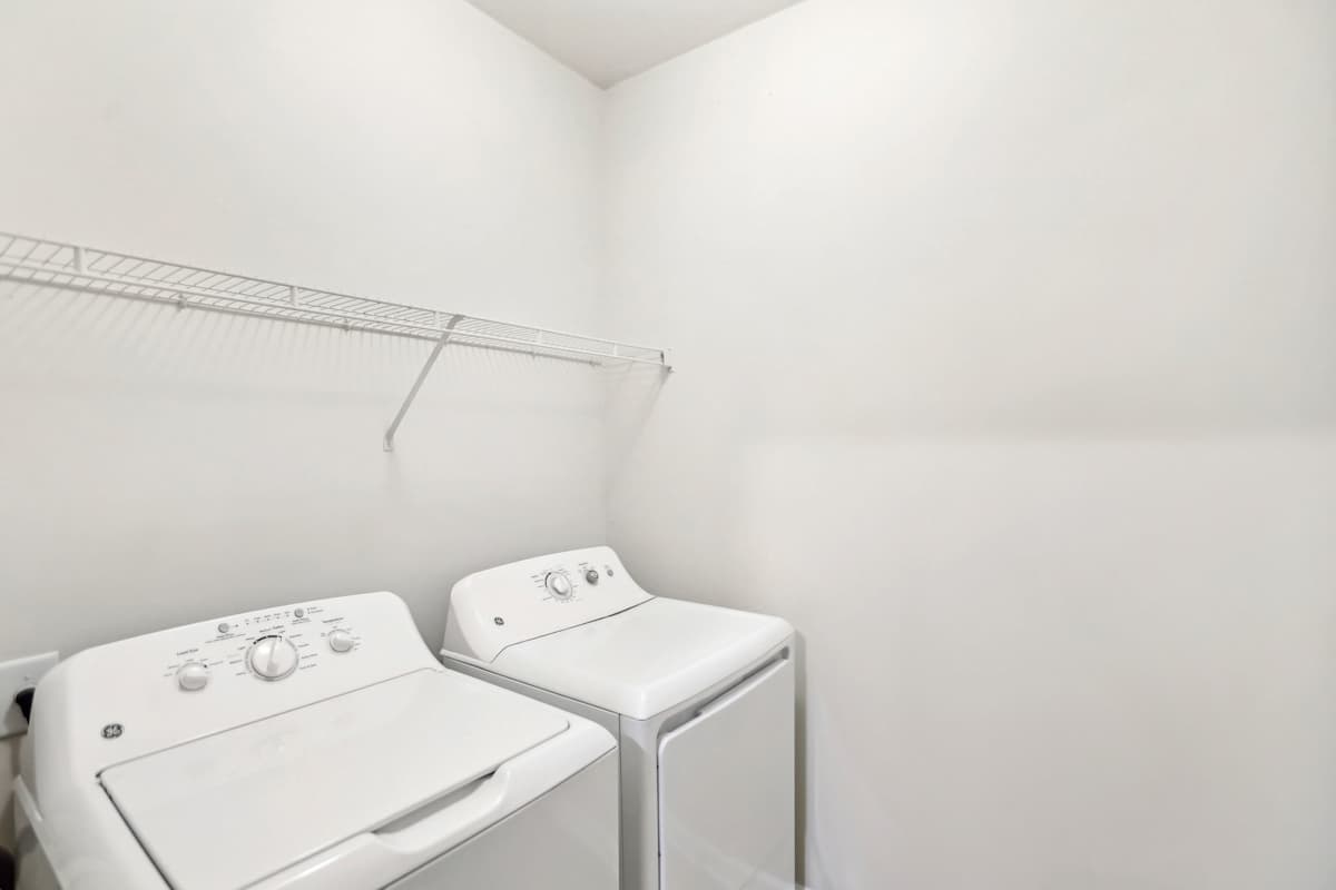 Wesley Kensington Apartments at Stonecrest apartment bedroom and bath area - Stonecrest, GA