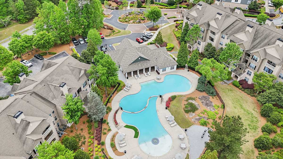 Wesley Kensington Apartments at Stonecrest pool and amenity area - Stonecrest, GA