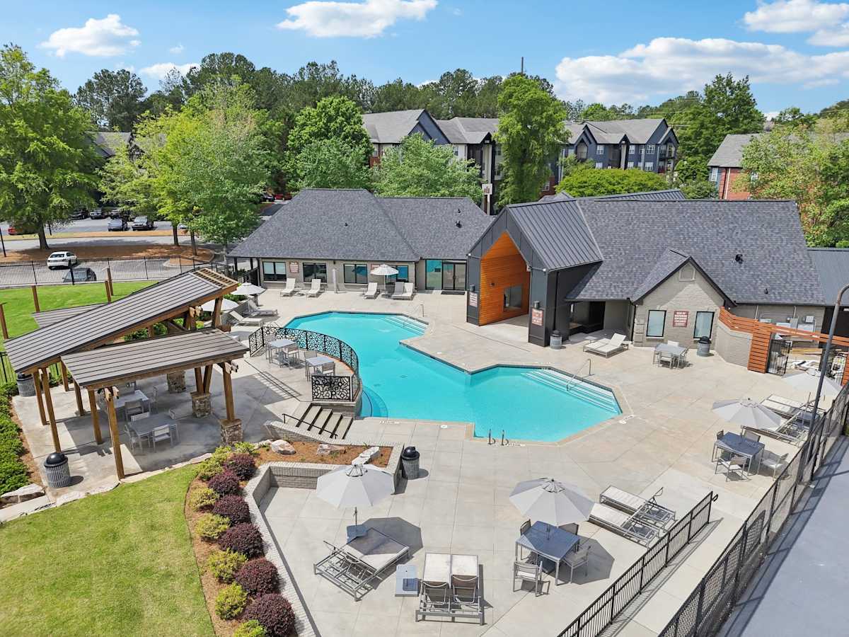 Wesley St. Claire Apartments at Lawrenceville swimming pool and sundeck - Lawrenceville, GA