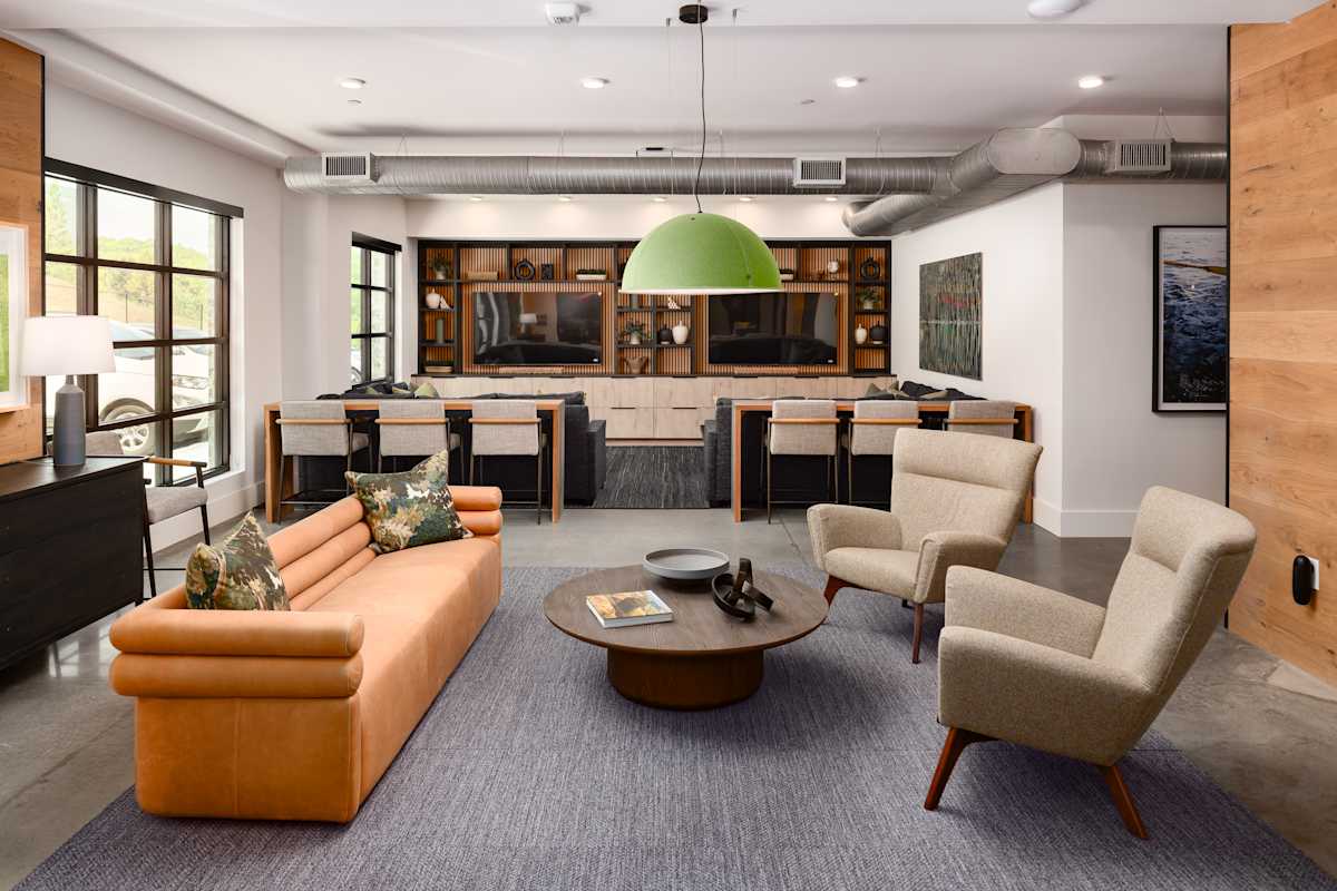 Heron Mill Apartments at Douglasville modern kitchen and living area - Douglasville, GA