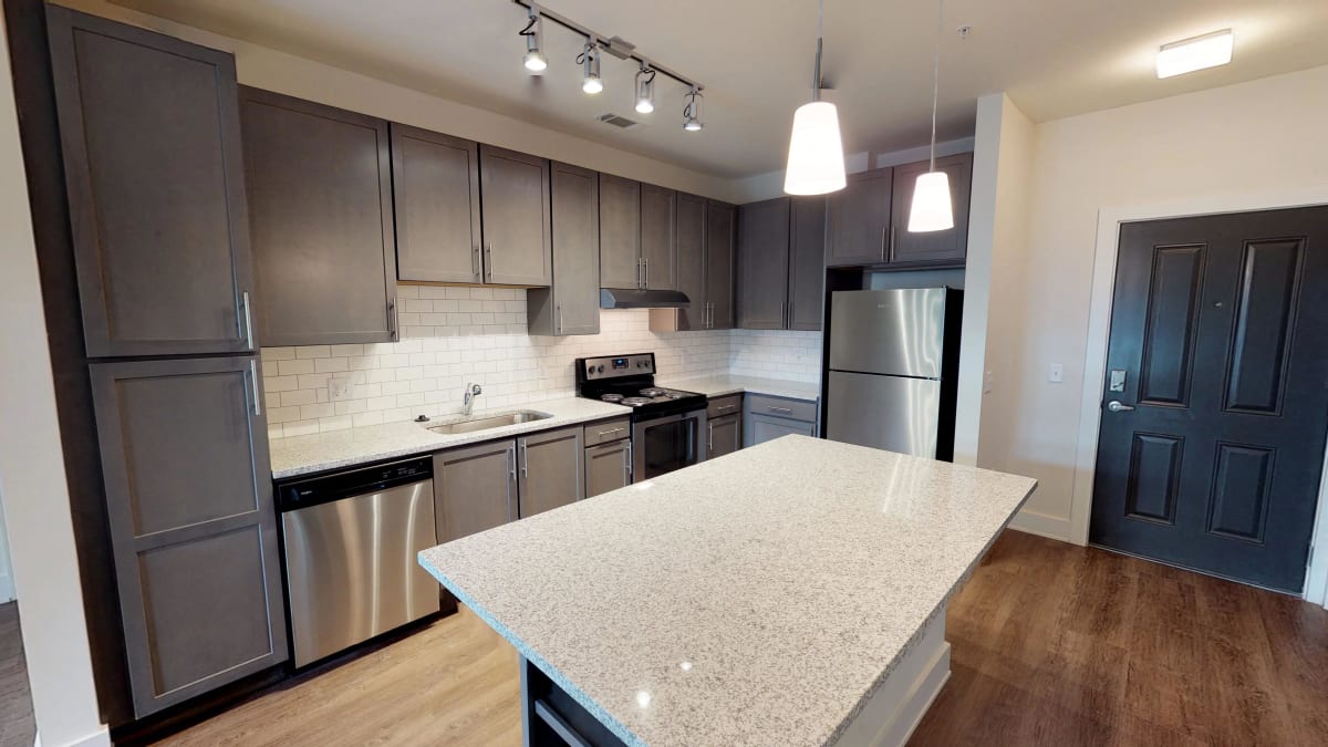 The Kirkwood Apartments kitchen with island - Atlanta, GA