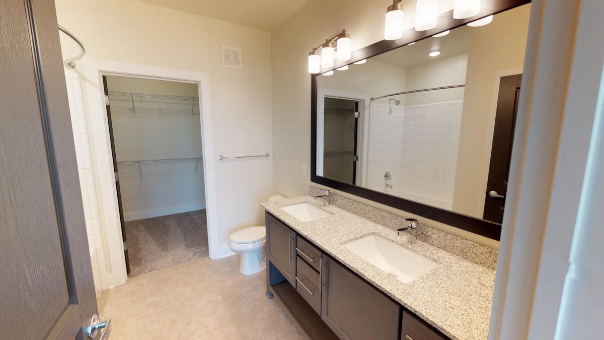 The Kirkwood Apartments bathroom and walk-in closet - Atlanta, GA