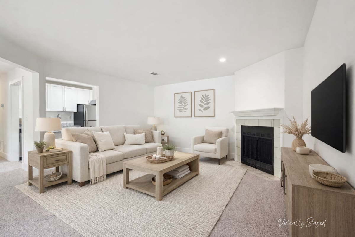 Wesley Trevento Apartments at Lithia Springs living room with fireplace - Lithia Springs, GA