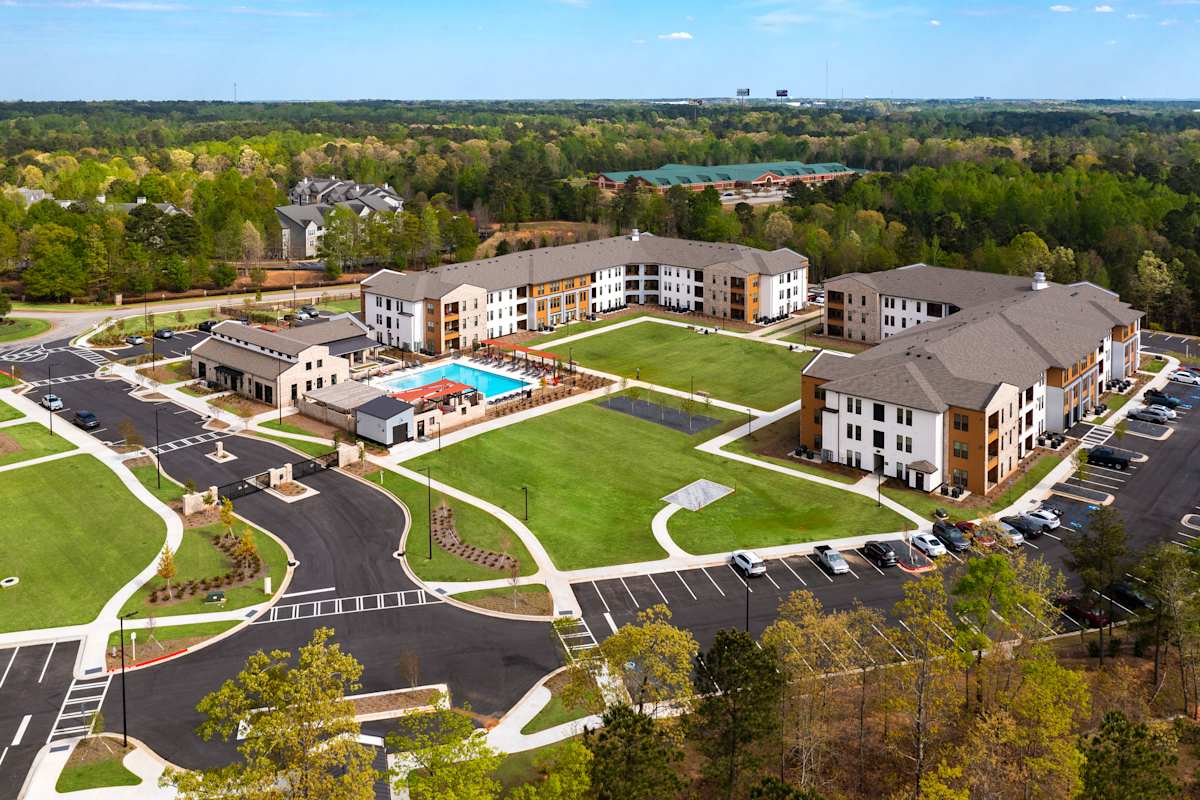 Station 75 Apartments at McDonough aerial community view - Locust Grove, GA