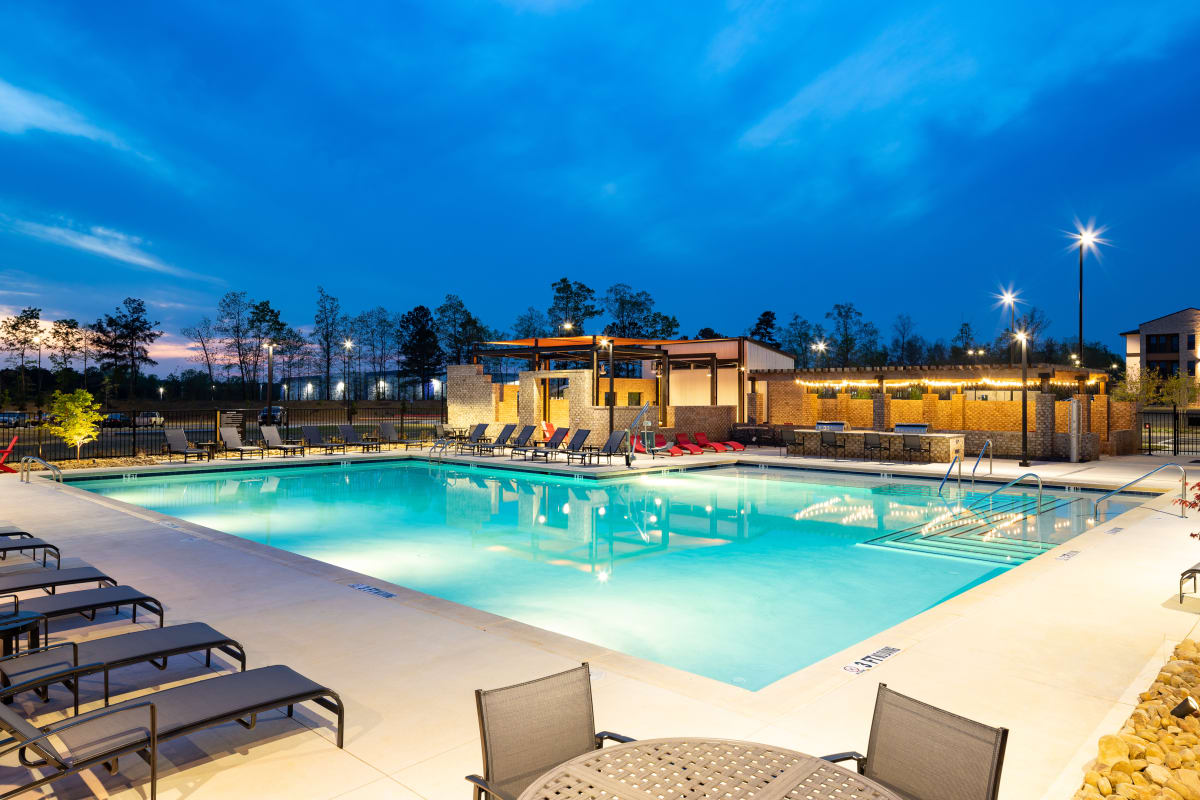 Station 75 Apartments at McDonough exterior at dusk - Locust Grove, GA