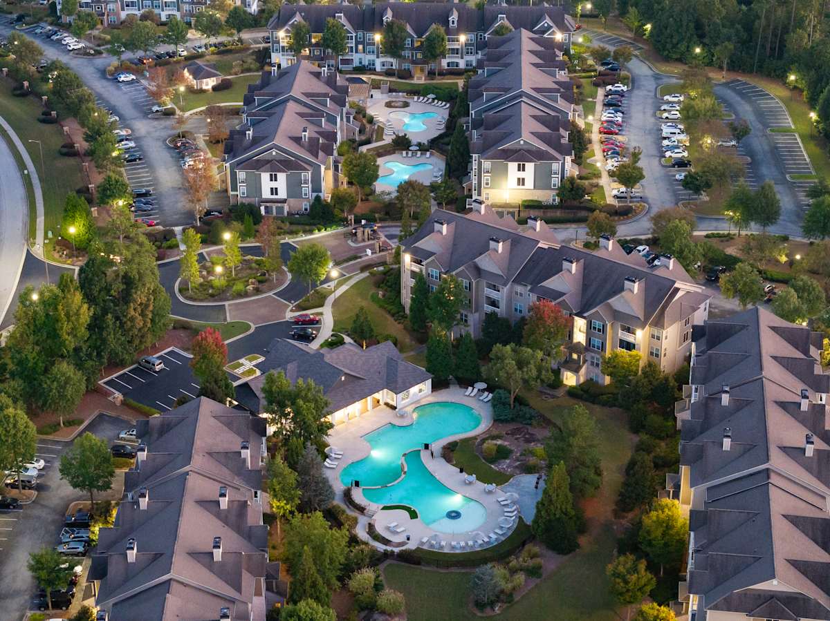 Wesley Kensington Apartments at Stonecrest drone twilight photo - Stonecrest, GA