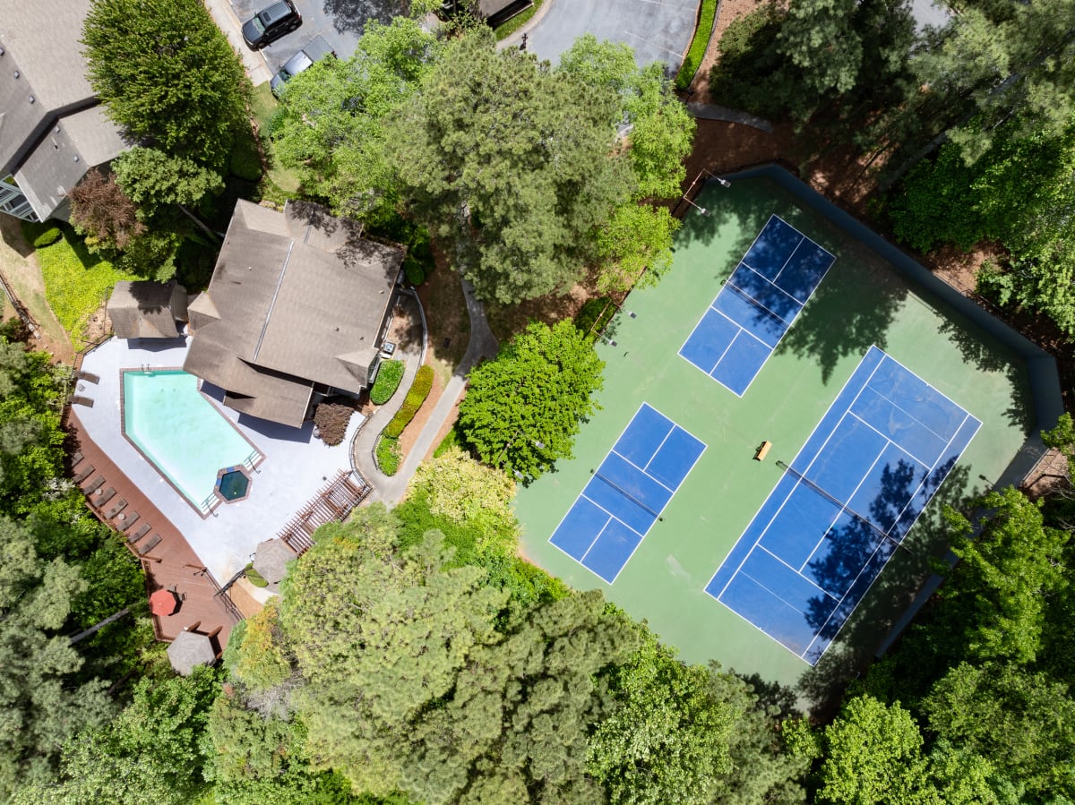 Lake views and landscaped grounds - Wesley Place Apartments, GA