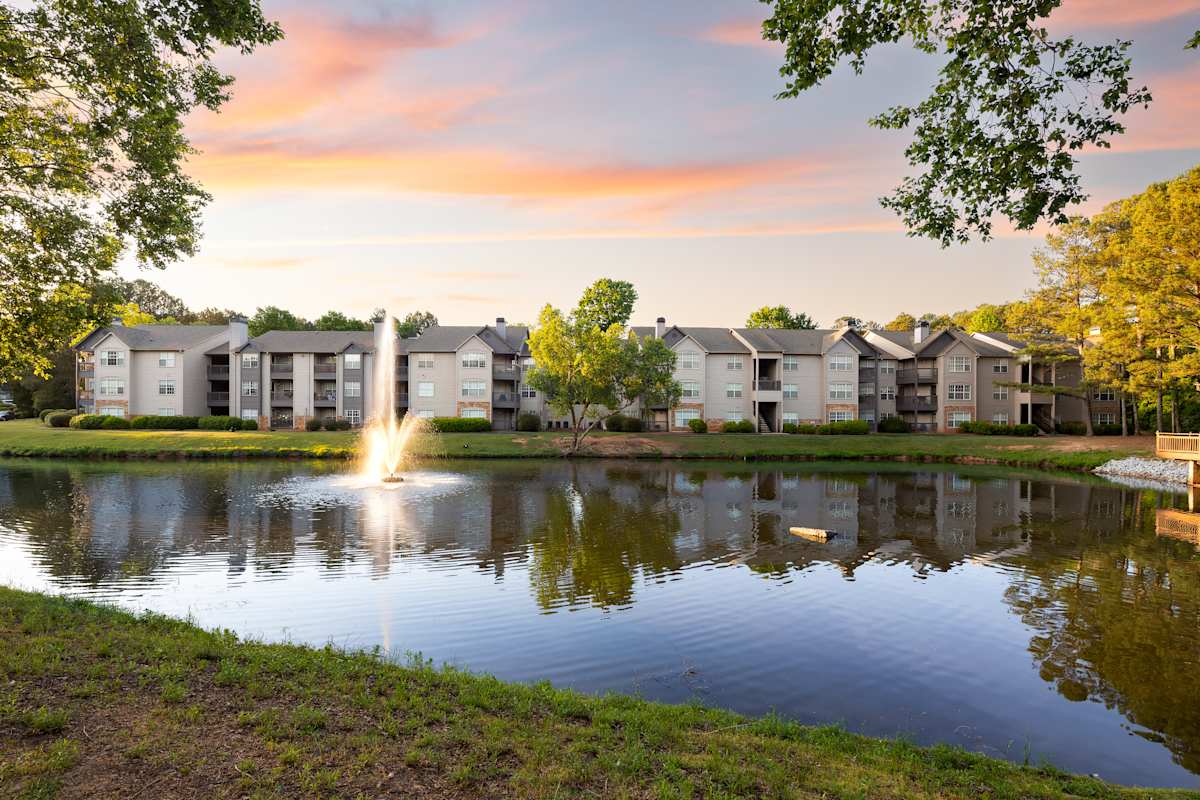Wesley Place Apartments exterior at dusk - Lawrenceville, GA