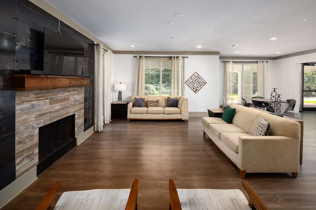 Wesley St. James Apartments at Sandy Springs resident clubhouse seating area - Atlanta, GA