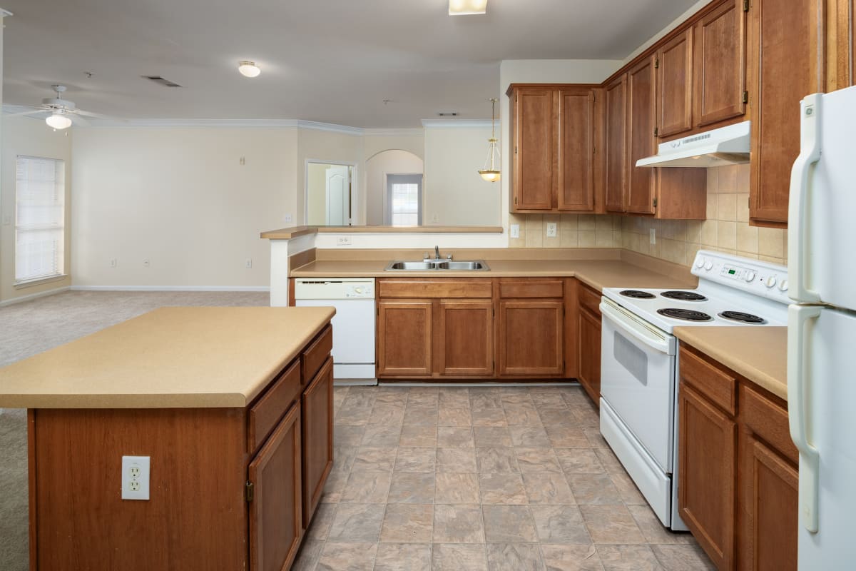 Wesley Stonecrest Apartments at Lithonia apartment kitchen and living space - Stonecrest, GA